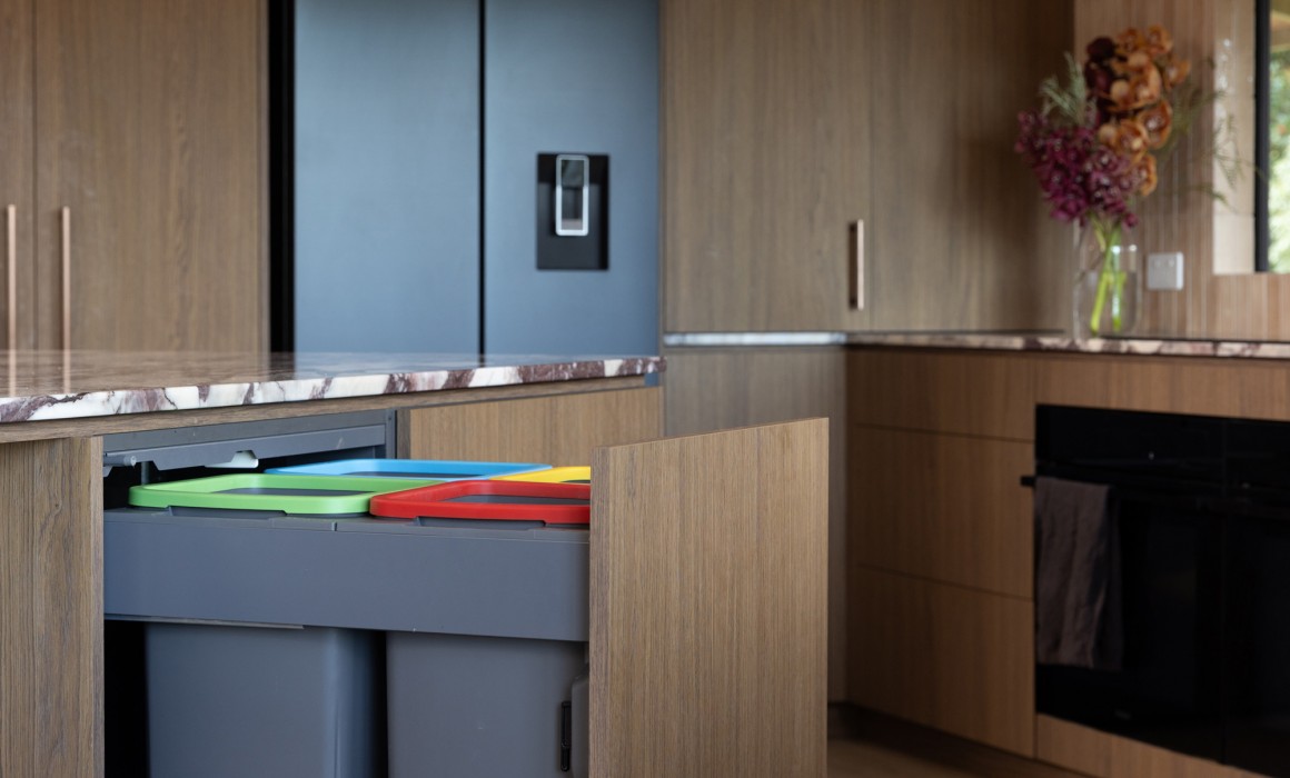 concealed kitchen bins colour coded woodgrain cabinetry 4