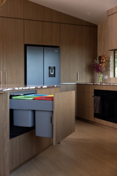 concealed kitchen bins colour coded woodgrain cabinetry 4