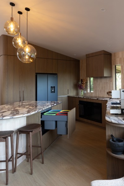 concealed kitchen bins colour coded woodgrain cabinetry
